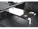 ＧＬ　登録済み未使用車２列目３名Ｉ－ｓｅａｔＲＥＶＯシート対面ラウンジベッド家具ＩＦ－ＷＲ９フローリングテーブル天井間接照明フルフラットベッド対面ラウンジ地ナビ後席モニター天井スピーカーセンターコンソール（37枚目）