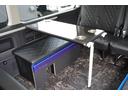 ＧＬ　登録済み未使用車２列目３名Ｉ－ｓｅａｔＲＥＶＯシート対面ラウンジベッド家具ＩＦ－ＷＲ９フローリングテーブル天井間接照明フルフラットベッド対面ラウンジ地ナビ後席モニター天井スピーカーセンターコンソール（42枚目）