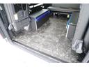 ＧＬ　登録済み未使用車２列目３名Ｉ－ｓｅａｔＲＥＶＯシート対面ラウンジベッド家具ＩＦ－ＷＲ９フローリングテーブル天井間接照明フルフラットベッド対面ラウンジ地ナビ後席モニター天井スピーカーセンターコンソール（47枚目）