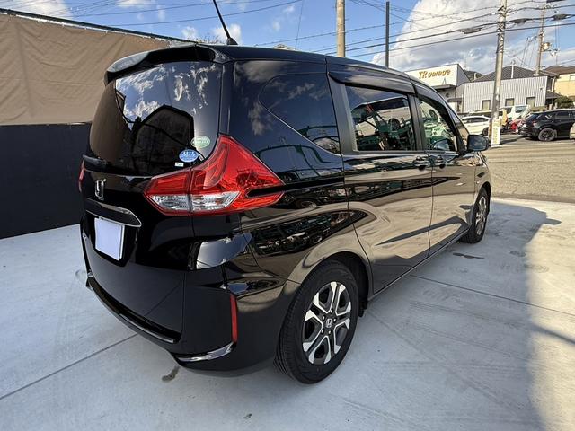 フリード G・ホンダセンシング ナビTV 後席モニター Bカメラ ETC Cパッケージ ホンダセンシング ワンオーナー禁煙 両側パワスラ ドラレコ クロスター用15AW ステアスイッチ ロールサンシェード プラズマクラスター付AAC(14枚目)