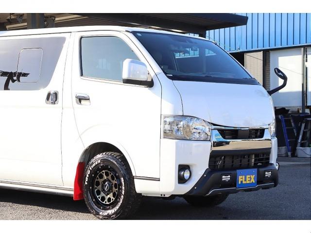 ハイエースバン スーパーGL ダークプライムII バッドフェイスボンネット TRDデイライト付きフロントスポイラー TRDマッドフラップ FLEXオーバーフェンダー RAYS 16インチAW TOYOオープンカントリー アルパインBIGXナビ(5枚目)