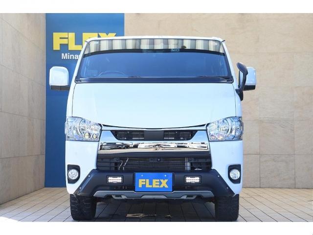 ハイエースバン スーパーGL ダークプライムII バッドフェイスボンネット TRDデイライト付きフロントスポイラー TRDマッドフラップ FLEXオーバーフェンダー RAYS 16インチAW TOYOオープンカントリー アルパインBIGXナビ(6枚目)