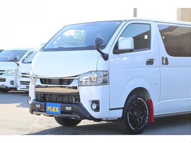 ハイエースバン スーパーGL ダークプライムII バッドフェイスボンネット TRDデイライト付きフロントスポイラー TRDマッドフラップ FLEXオーバーフェンダー RAYS 16インチAW TOYOオープンカントリー アルパインBIGXナビ(7枚目)