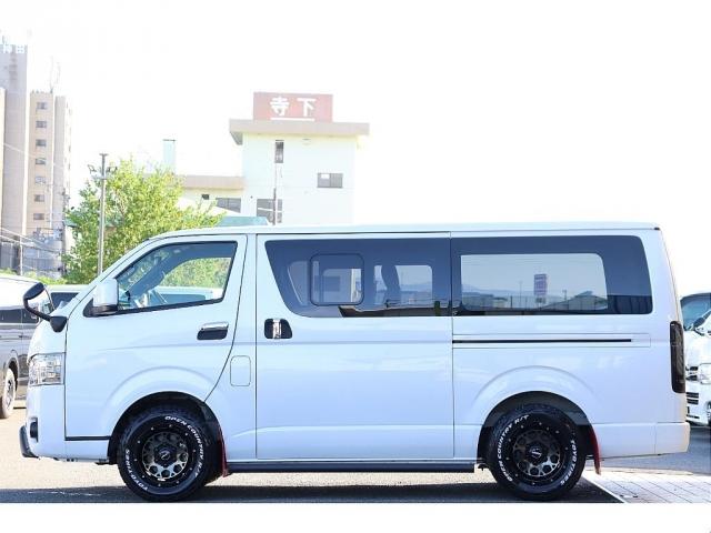 ハイエースバン スーパーGL ダークプライムII バッドフェイスボンネット TRDデイライト付きフロントスポイラー TRDマッドフラップ FLEXオーバーフェンダー RAYS 16インチAW TOYOオープンカントリー アルパインBIGXナビ(9枚目)