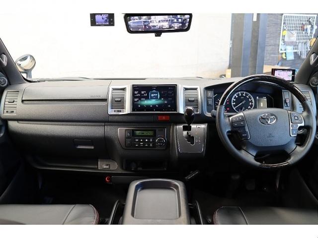 ハイエースバン スーパーGL ダークプライムII バッドフェイスボンネット TRDデイライト付きフロントスポイラー TRDマッドフラップ FLEXオーバーフェンダー RAYS 16インチAW TOYOオープンカントリー アルパインBIGXナビ(13枚目)