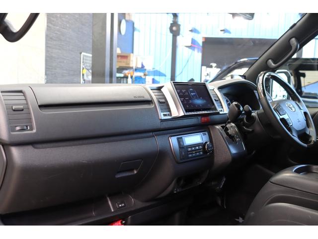 ハイエースバン スーパーGL ダークプライムII バッドフェイスボンネット TRDデイライト付きフロントスポイラー TRDマッドフラップ FLEXオーバーフェンダー RAYS 16インチAW TOYOオープンカントリー アルパインBIGXナビ(22枚目)