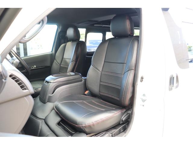 ハイエースバン スーパーGL ダークプライムII バッドフェイスボンネット TRDデイライト付きフロントスポイラー TRDマッドフラップ FLEXオーバーフェンダー RAYS 16インチAW TOYOオープンカントリー アルパインBIGXナビ(23枚目)