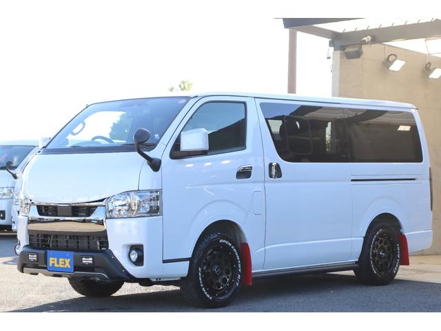 ハイエースバン スーパーGL ダークプライムII バッドフェイスボンネット TRDデイライト付きフロントスポイラー TRDマッドフラップ FLEXオーバーフェンダー RAYS 16インチAW TOYOオープンカントリー アルパインBIGXナビ(28枚目)
