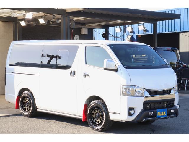 ハイエースバン スーパーGL ダークプライムII バッドフェイスボンネット TRDデイライト付きフロントスポイラー TRDマッドフラップ FLEXオーバーフェンダー RAYS 16インチAW TOYOオープンカントリー アルパインBIGXナビ(29枚目)
