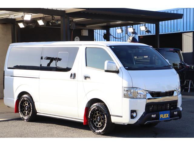 ハイエースバン スーパーGL ダークプライムII バッドフェイスボンネット TRDデイライト付きフロントスポイラー TRDマッドフラップ FLEXオーバーフェンダー RAYS 16インチAW TOYOオープンカントリー アルパインBIGXナビ(30枚目)