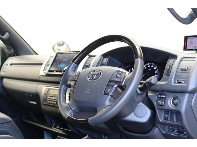 ハイエースバン スーパーGL ダークプライムII バッドフェイスボンネット TRDデイライト付きフロントスポイラー TRDマッドフラップ FLEXオーバーフェンダー RAYS 16インチAW TOYOオープンカントリー アルパインBIGXナビ(31枚目)