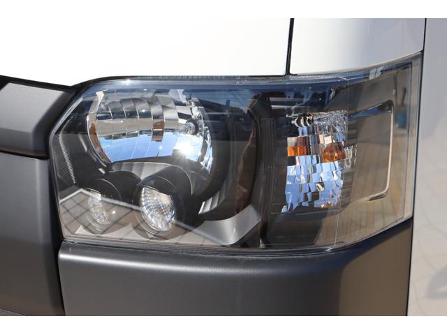 ハイエースバン ロングDX リヤクーラー・ヒーター付 WoodVillageBlackEdition FLEX T-Forceフロントスポイラー FLEX オーバーフェンダー FLEX NEXUSCREST 16インチAW(27枚目)