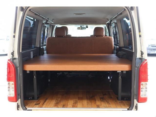 ハイエースバン スーパーGL ダークプライム Re classic社外製ボンネットDUNLOP GRANDTEK16インチタイヤNEXUSTRAIL16インチAWFLEXクラシックシートカバーベッドキット木目調カーゴパネルパナソニック7インチナビ(2枚目)