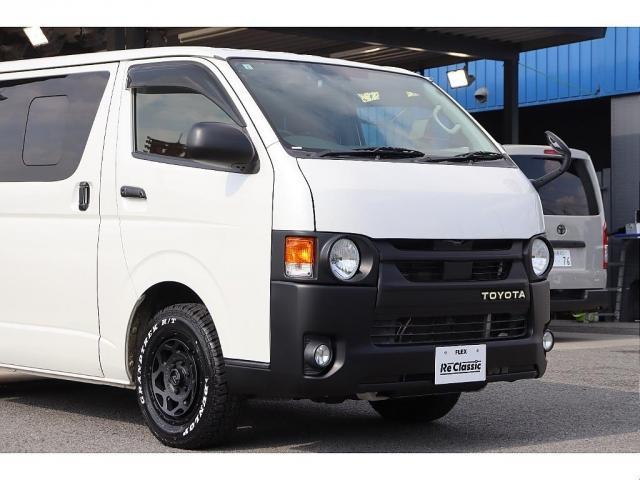 ハイエースバン スーパーGL ダークプライム Re classic社外製ボンネットDUNLOP GRANDTEK16インチタイヤNEXUSTRAIL16インチAWFLEXクラシックシートカバーベッドキット木目調カーゴパネルパナソニック7インチナビ(6枚目)