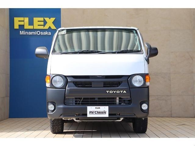 ハイエースバン スーパーGL ダークプライム Re classic社外製ボンネットDUNLOP GRANDTEK16インチタイヤNEXUSTRAIL16インチAWFLEXクラシックシートカバーベッドキット木目調カーゴパネルパナソニック7インチナビ(7枚目)