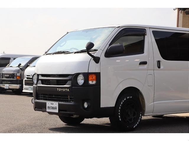 ハイエースバン スーパーGL ダークプライム Re classic社外製ボンネットDUNLOP GRANDTEK16インチタイヤNEXUSTRAIL16インチAWFLEXクラシックシートカバーベッドキット木目調カーゴパネルパナソニック7インチナビ(8枚目)