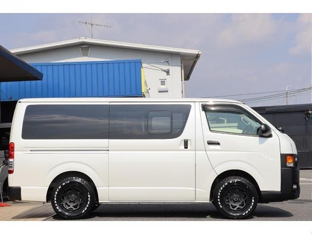 ハイエースバン スーパーGL ダークプライム Re classic社外製ボンネットDUNLOP GRANDTEK16インチタイヤNEXUSTRAIL16インチAWFLEXクラシックシートカバーベッドキット木目調カーゴパネルパナソニック7インチナビ(9枚目)