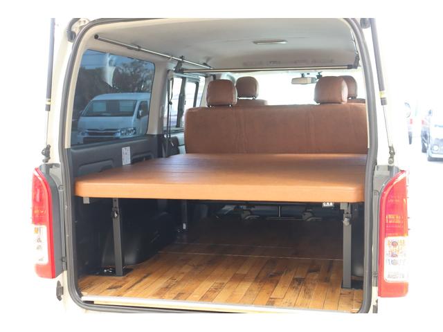 ハイエースバン スーパーGL ダークプライム Re classic社外製ボンネットDUNLOP GRANDTEK16インチタイヤNEXUSTRAIL16インチAWFLEXクラシックシートカバーベッドキット木目調カーゴパネルパナソニック7インチナビ(26枚目)