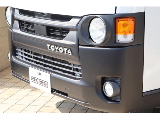 ハイエースバン スーパーGL ダークプライム Re classic社外製ボンネットDUNLOP GRANDTEK16インチタイヤNEXUSTRAIL16インチAWFLEXクラシックシートカバーベッドキット木目調カーゴパネルパナソニック7インチナビ(34枚目)