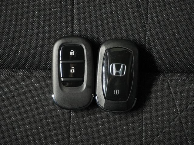 ヴェゼル e:HEVX 2年保証 当社試乗車 デカナビ ドラレコ リアカメら ETC クルコンBT ホンダセンシング スレートグレーパール ハイブリッドXタイプ CD DVD 音楽録音 サイドカーテンエアバック アルミ(19枚目)