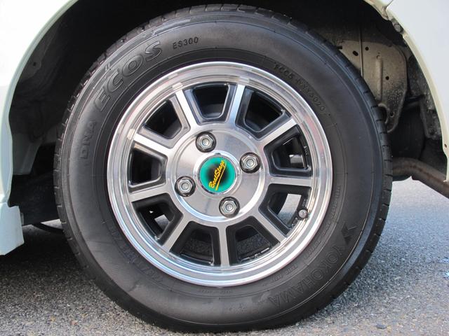 エブリイワゴン 車椅子移動者 分割式リアシート付 電動オートステップ装着車 純正ナビ(CN-RZ765W)フルセグTV・Bカメラ・ドラレコ・Bluetooth接続・衝突軽減システム・左オートステップ・電格ミラー・フォグランプ・ETC・スマートキー・社外12インチアルミホイール(56枚目)