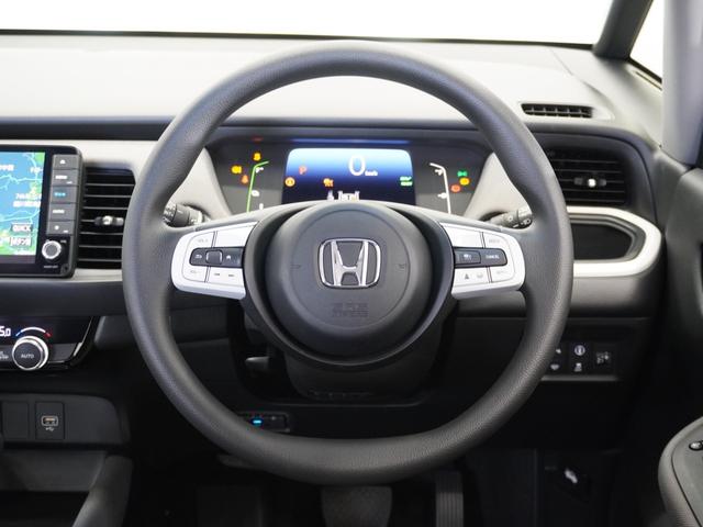 フィット ｅ：ＨＥＶクロスター　２年保証ナビＤレコＲカメＥＴＣクルコンＢＴ地デジ　禁煙車　ホンダセンシング　ＨｏｎｄａＣＯＮＮＥＣＴ　クロスター　前後ドライブレコーダー　純正用品ナビゲーション　純正アルミホイール（9枚目）