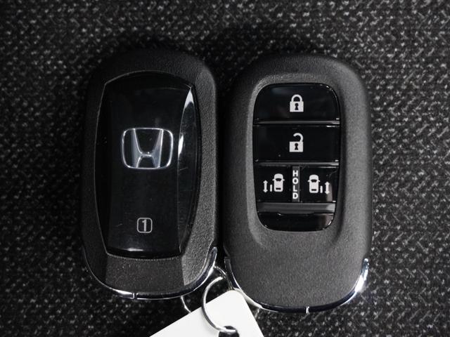 N-BOXカスタム ベースグレード 2年保証当社試乗車ナビDレコRカメETC両電扉 ホンダセンシング シートヒーター LEDヘッドライト+デイライト オートライト リヤスクリーンサンシェード シートバックテーブル 純正アルミホイール(18枚目)