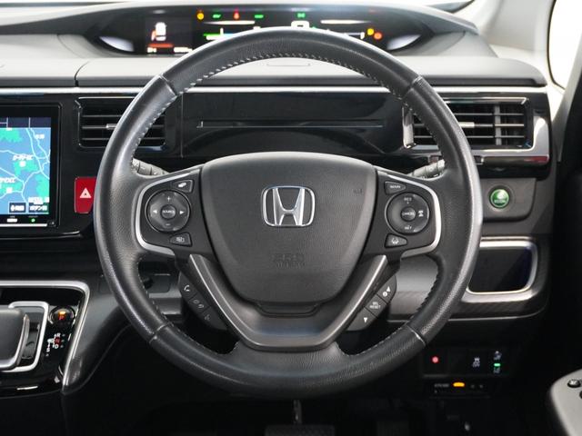 ステップワゴンスパーダ e:HEVスパーダGホンダセンシング 1オーナ1年保証ナビDレコ全周囲カメETC2.0 両側電動スライドドア 禁煙車 ホンダセンシング LEDヘッドライト オートライト わくわくゲート リアスクリーンサンシェード シートバックテーブル(10枚目)