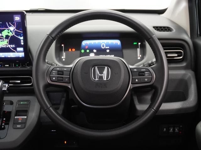 フリード クロスター　２年保証当社試乗車ナビＤレコＲカメＥＴＣ両電扉　禁煙車　ホンダセンシング　ＬＥＤヘッドライト＋デイライト　ＨｏｎｄａＣＯＮＮＥＣＴ　ブラインドスポットインフォメーション　リヤスクリーンサンシェード（9枚目）