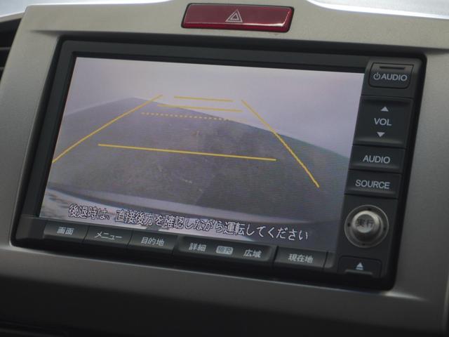 フリード Ｇエアロ　１年保証ナビＲカメＥＴＣ両電扉ＢＴワンセグＨＩＤ　禁煙車　ＦＯＰメモリーナビゲーション　電動コーナーポール装備　純正アルミホイール　コンビニフック　サードシート跳ね上げ式シートアレンジ（3枚目）