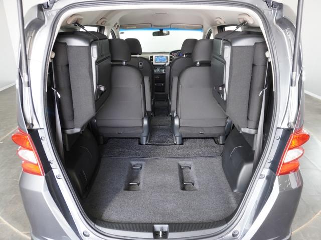 フリード Ｇエアロ　１年保証ナビＲカメＥＴＣ両電扉ＢＴワンセグＨＩＤ　禁煙車　ＦＯＰメモリーナビゲーション　電動コーナーポール装備　純正アルミホイール　コンビニフック　サードシート跳ね上げ式シートアレンジ（23枚目）