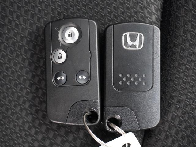 ステップワゴンスパーダ Z 1年保証ナビ後席モニタDレコRカメETC両電扉 禁煙車 HIDヘッドライト オートライト フォグライト装備 クルーズコントロール パドルシフト 純正用品ナビ VXM-152VFi(19枚目)