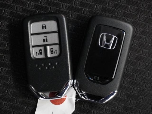 ステップワゴンスパーダ スパーダ・クールスピリットホンダセンシング 1オーナ1年保証ナビ後席モニタDレコRカメETC両電扉 ホンダセンシング 禁煙車 後席フリップダウンモニター わくわくゲート リアドアスクリーンサンシェード シートバックテーブル LEDヘッドライト(20枚目)