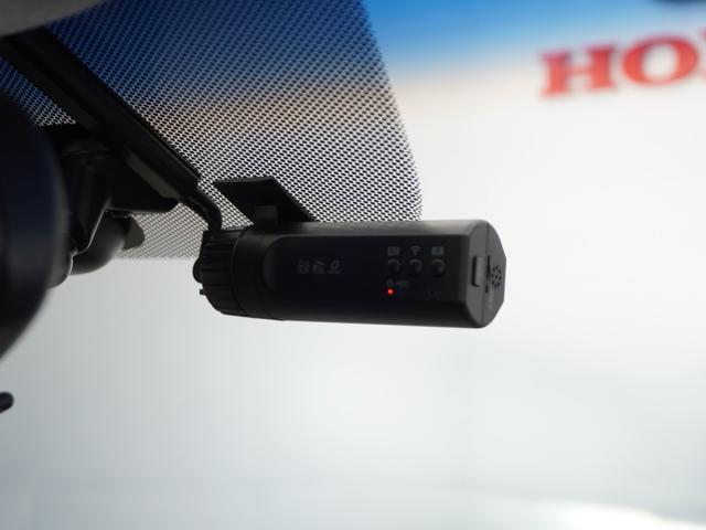 フリードハイブリッド ハイブリッド・ＥＸ　１年保証ナビＤレコＲカメＥＴＣ両電扉ＢＴ地デジ　禁煙車　ホンダセンシング　ＬＥＤヘッドライト　オートライト　シートヒーター　前後ドライブレコーダー　リヤスクリーンサンシェード　純正用品ナビゲーション（4枚目）