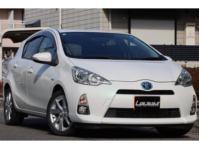 アクア G ナビ/フルセグTV/ETC/キーレス/アイドリングストップ/ヘッドライトレベライザー/オートエアコン/電動格納式ミラー/横滑り防止装置/エアコン/パワステ/パワーウインドウ/ドアバイザー/Pガラス(4枚目)