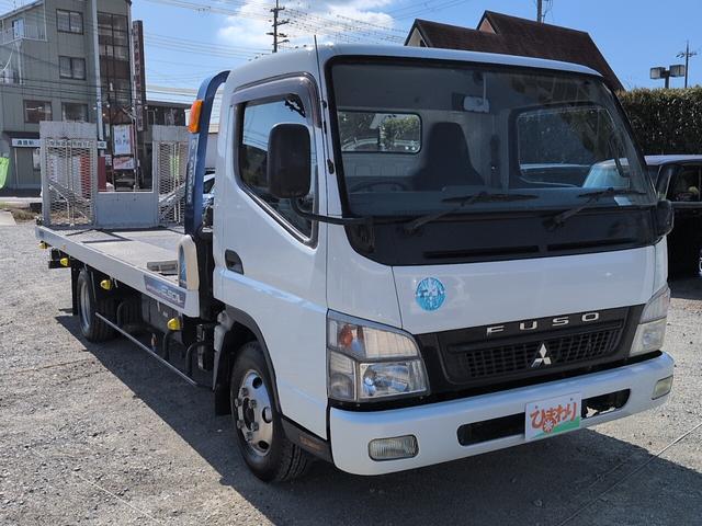 キャンター 積載車　ターボ　タダノ低床ロングボディ　ラジコン　ウインチ　ナビ　ＴＶ　ＥＴＣ　左電動格納ミラー　運転席エアバッグ　ＡＢＳ　ヘッドライトレベライザー　エアコン　パワステ　パワーウインド　荷台内寸５８４０ｃｍ（4枚目）