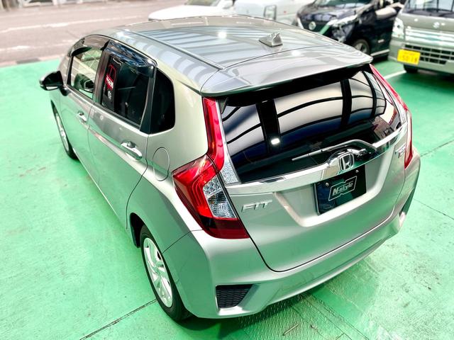 フィットハイブリッド Ｌパッケージ　禁煙　ワンオーナー　ＬＥＤ　ドラレコ　レーダー　純正ナビ　ＴＶ／Ｂｌｕｅｔｏｏｔｈ／ＣＤ／ＤＶＤ　バックカメラ　ＥＴＣ　ハーフレザー　クルコン　シャークフィンアンテナ（27枚目）