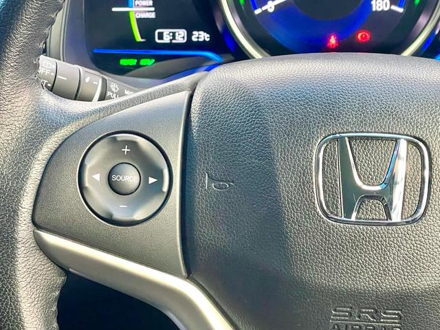 フィットハイブリッド Ｌパッケージ　禁煙　ワンオーナー　ＬＥＤ　ドラレコ　レーダー　純正ナビ　ＴＶ／Ｂｌｕｅｔｏｏｔｈ／ＣＤ／ＤＶＤ　バックカメラ　ＥＴＣ　ハーフレザー　クルコン　シャークフィンアンテナ（38枚目）