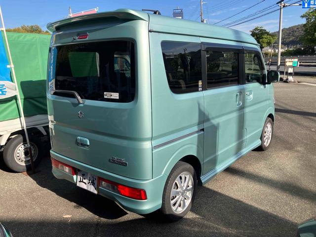 エブリイワゴン ＰＺターボスペシャル　レンタカーアップ　ＥＴＣ　バックカメラ　両側電動スライドドア　ナビ　ＴＶ　衝突被害軽減システム　オートライト　ＨＩＤ　スマートキー　電動格納ミラー　ベンチシート　ＡＴ　盗難防止システム　ＡＢＳ　ＥＳＣ（5枚目）