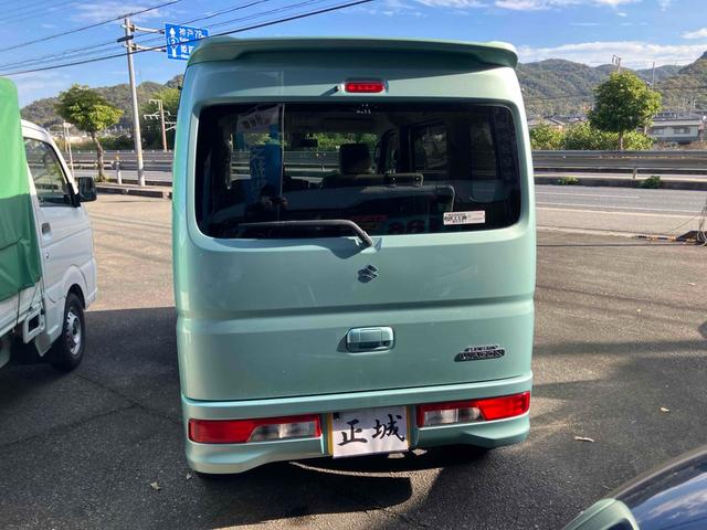 エブリイワゴン ＰＺターボスペシャル　レンタカーアップ　ＥＴＣ　バックカメラ　両側電動スライドドア　ナビ　ＴＶ　衝突被害軽減システム　オートライト　ＨＩＤ　スマートキー　電動格納ミラー　ベンチシート　ＡＴ　盗難防止システム　ＡＢＳ　ＥＳＣ（6枚目）