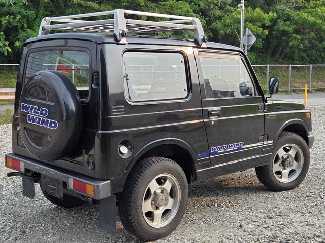 ジムニー ワイルドウインドリミテッド　オートマ　４ＷＤ　ルーフキャリア　走行距離９９９００ｋｍ　エアコン　パワステ（5枚目）