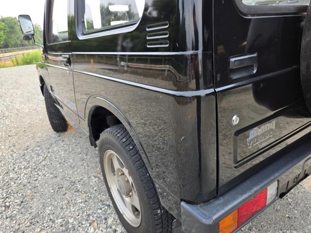 ジムニー ワイルドウインドリミテッド　オートマ　４ＷＤ　ルーフキャリア　走行距離９９９００ｋｍ　エアコン　パワステ（19枚目）