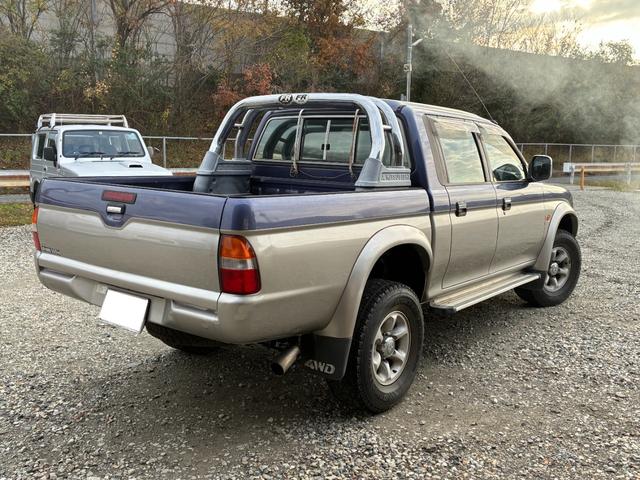 ストラーダ ベースグレード　ピックアップトラック　ロールバー　エアコン　パワステ　パワーウィンド（9枚目）