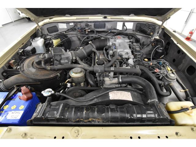ランドクルーザー６０ ＶＸ　ガソリン車　ルーフ換装　ナローボディ仕様　丸目換装　リフトアップ公認済み　ヒッチメンバー　シートカバー　ＥＴＣ　フルセグナビ（6枚目）
