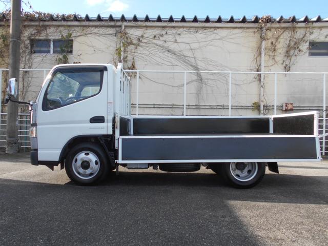 ＮＴ４５０アトラス フルスーパーロー平ボディ　カスタム　２０００ｋｇ積み４ナンバー　リアＷタイヤ　社外ナビＴＶ　ＥＴＣ　キーレス　スペアキー　両側電動格納ミラー　衝突被害軽減ブレーキ　車線逸脱警報装置　横滑り防止装置　荷台床鉄板張り　坂道発進補助装置（5枚目）