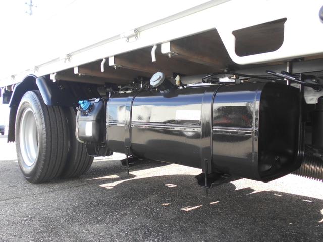 ＮＴ４５０アトラス フルスーパーロー平ボディ　カスタム　２０００ｋｇ積み４ナンバー　リアＷタイヤ　社外ナビＴＶ　ＥＴＣ　キーレス　スペアキー　両側電動格納ミラー　衝突被害軽減ブレーキ　車線逸脱警報装置　横滑り防止装置　荷台床鉄板張り　坂道発進補助装置（14枚目）