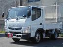 キャンター 全低床強化ダンプ　２ｔ積み４ナンバー　ＡＴ車　三方開　左電格ミラー　キーレス　坂道発進補助装置　車線逸脱警報装置　横滑り防止装置　衝突被害軽減ブレーキ　ＥＣＯモードスイッチ　荷台塗装仕上げ済　中間ピン×２　純正マット＆ドアバイザー　ＬＥＤ室内灯（2枚目）