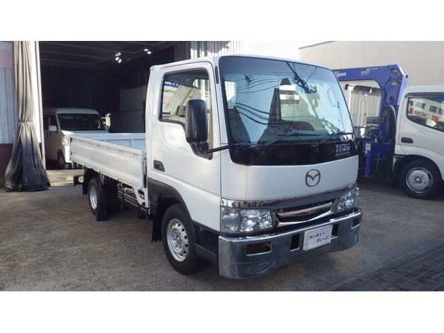 タイタンダッシュ 　低床１．３５ｔ平ボディ／積載１３５０ｋｇ／車両総重量３０２５ｋｇ／５速マニュアル／２０００ｃｃガソリンエンジン／ＥＴＣ付き／エアコン／パワステ／パワーウインドウ／仕上げ済み（2枚目）