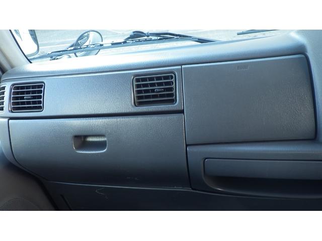 タイタンダッシュ 　低床１．３５ｔ平ボディ／積載１３５０ｋｇ／車両総重量３０２５ｋｇ／５速マニュアル／２０００ｃｃガソリンエンジン／ＥＴＣ付き／エアコン／パワステ／パワーウインドウ／仕上げ済み（65枚目）