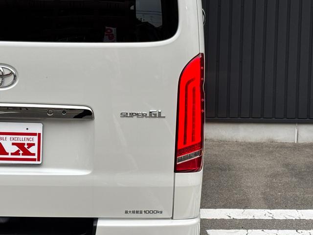 ハイエースバン スーパーGL ダークプライムII 禁煙 モデリスタフルエアロ ESSEX18AW ローダウン オーバーフェンダー リヤスポ シルクブレイズフェンダーミラー 社外LEDテール 革調シートカバー LEDヘッド アルパインナビ フルセグTV(56枚目)